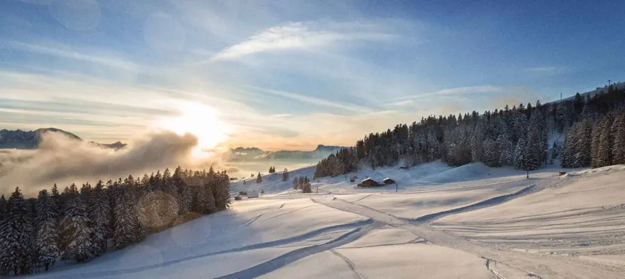 The snow-covered winter landscape in the Fuschlsee region.
