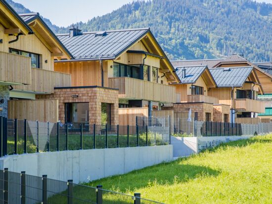 Several chalets in the Salzkammergut in Austria, they are built next to each other and belong to Das Hintersee in Austria