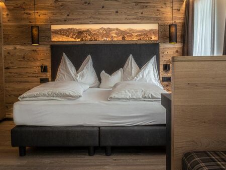 The cosy double bed with high-quality natural fabrics offers the best sleeping comfort