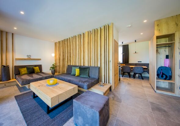 The modern living room with couch and table from the chalet.