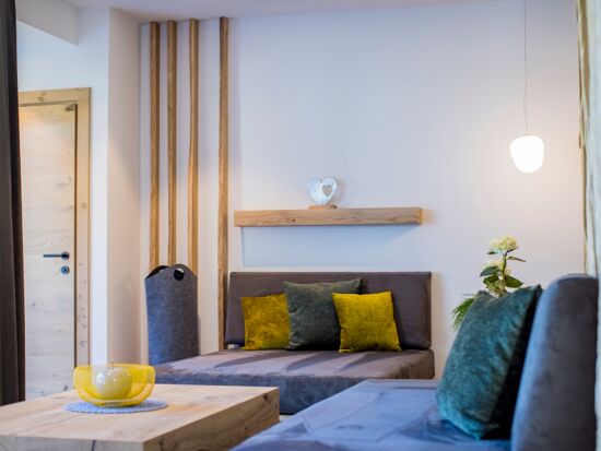Cosy feel-good corner in the living room of the chalets in Hintersee
