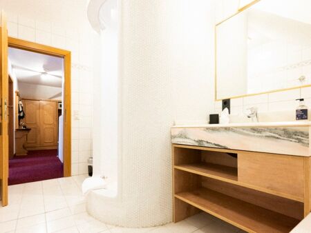 View from the spacious bathroom of the Auhof Suite at Hotel Das Hintersee in the Salzkammergut region