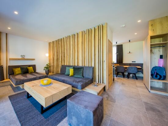 The modern living room with couch and table from the chalet.