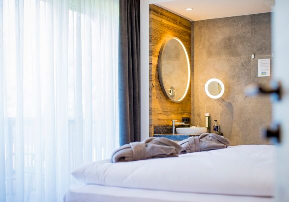 The modern bathroom right next to the bedroom