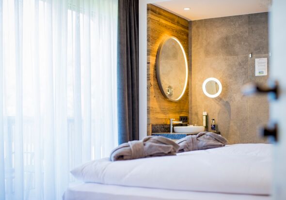 The modern bathroom right next to the bedroom