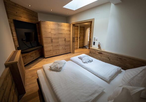 Double bed with huge flat screen TV