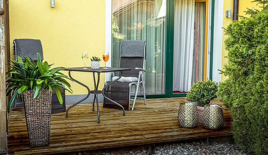 The modern wooden terrace of the Hotel Room Feichtenstein