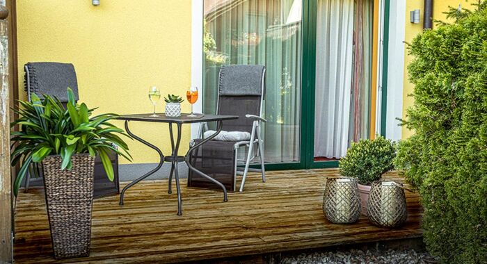 The modern wooden terrace of the Hotel Room Feichtenstein