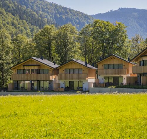 Exterior view of four luxury chalets in the Austrian Salzkammergut region