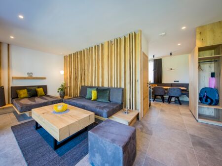 The modern living room with couch and table from the chalet.