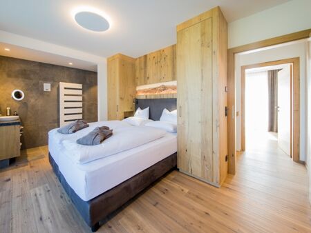 The modern bedroom in the chalet