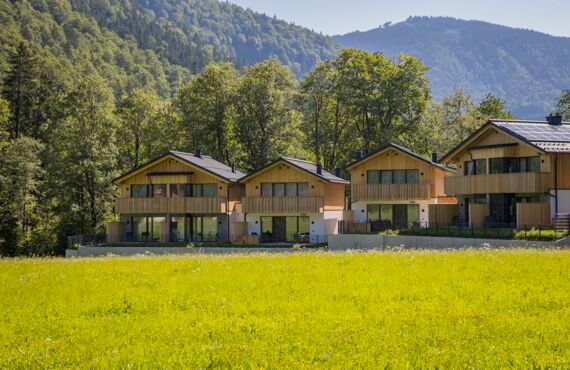 Exterior view of four luxury chalets in the Austrian Salzkammergut region