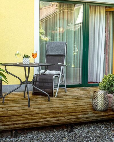 The modern wooden terrace of the Hotel Room Feichtenstein