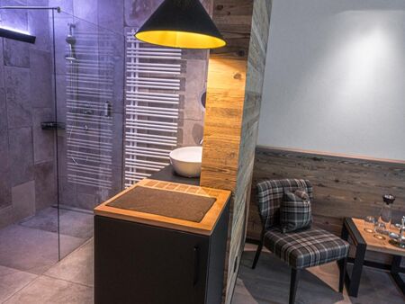 Glass shower and washbasin in the bathroom